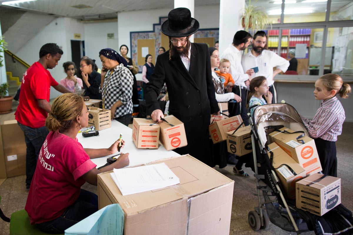 חוששים מסוריה: היסטריה במוקדי חלוקת ערכות מגן