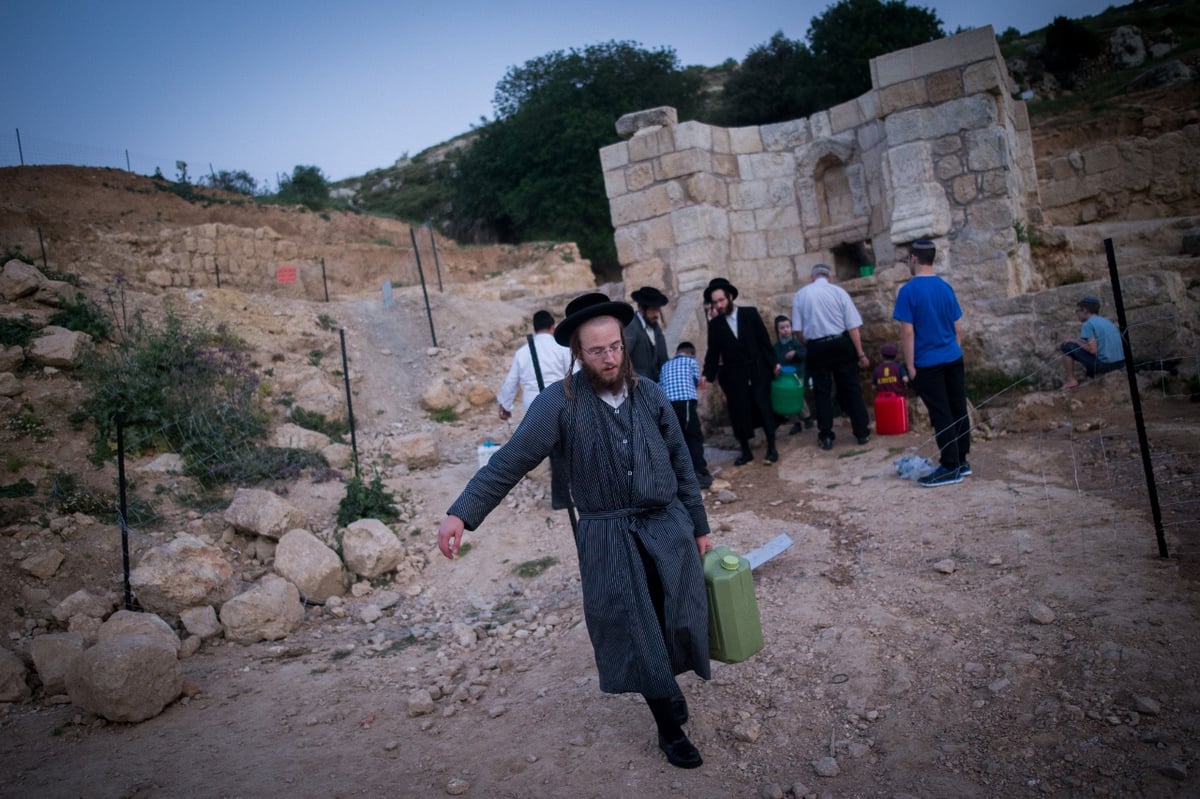 בריקוד ולצד הטובלים: שאיבת 'מים שלנו' בהרי ירושלים