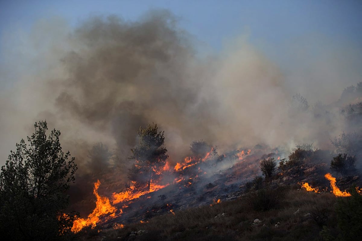 מעל 200 שריפות בפחות מיממה; האש מתקרבת לכביש 1