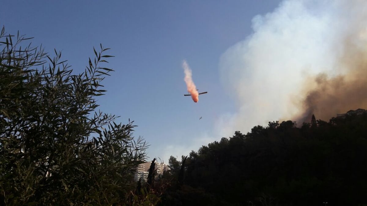 אש בחיפה: כ-60 אלף איש פונו מבתיהם, כ-100 פצועים קל