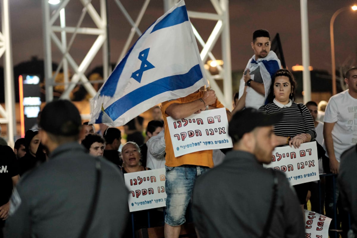 עימותים בטקס זיכרון ישראלי-פלסטיני. צפו