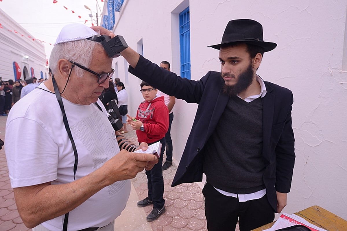 חגיגות ל"ג בעומר באי ג'רבה בתוניסיה • צפו