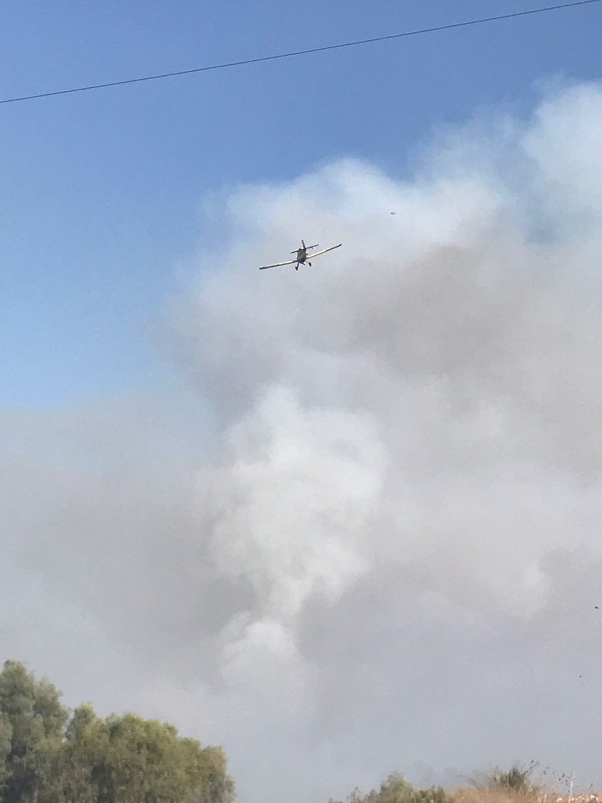 שריפת קוצים ליד כביש 1: תושבי משמר איילון פונו מבתיהם