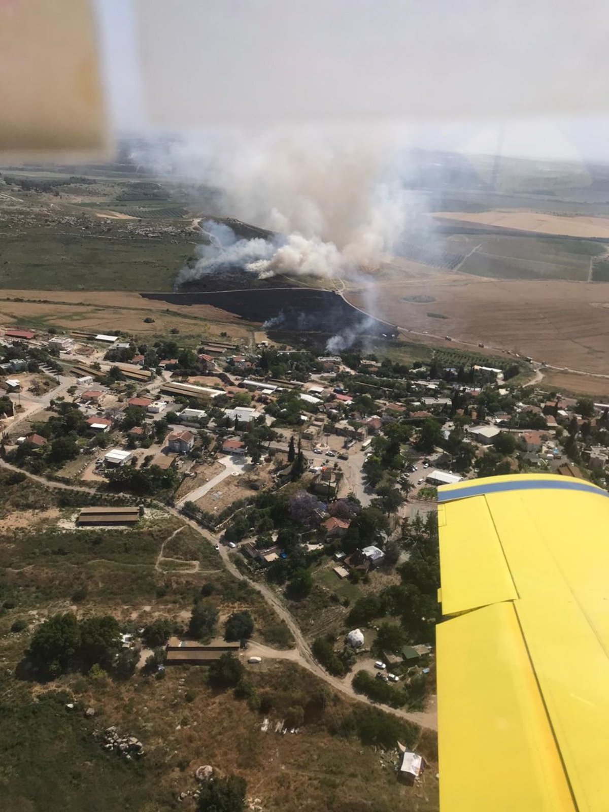 גל החום הקיצוני: למעלה מ-11 שריפות כובו במסוק