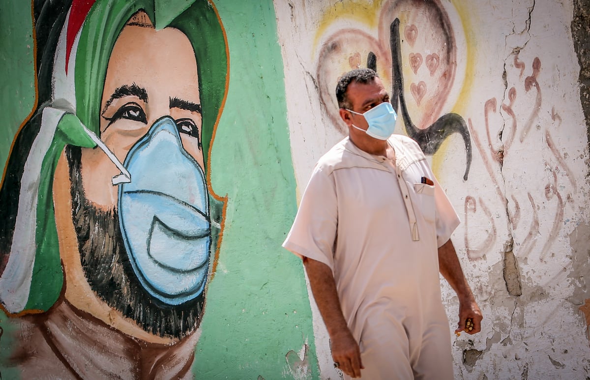 ה'קורונה' בעזה: ציורי קיר לעידוד המסכות