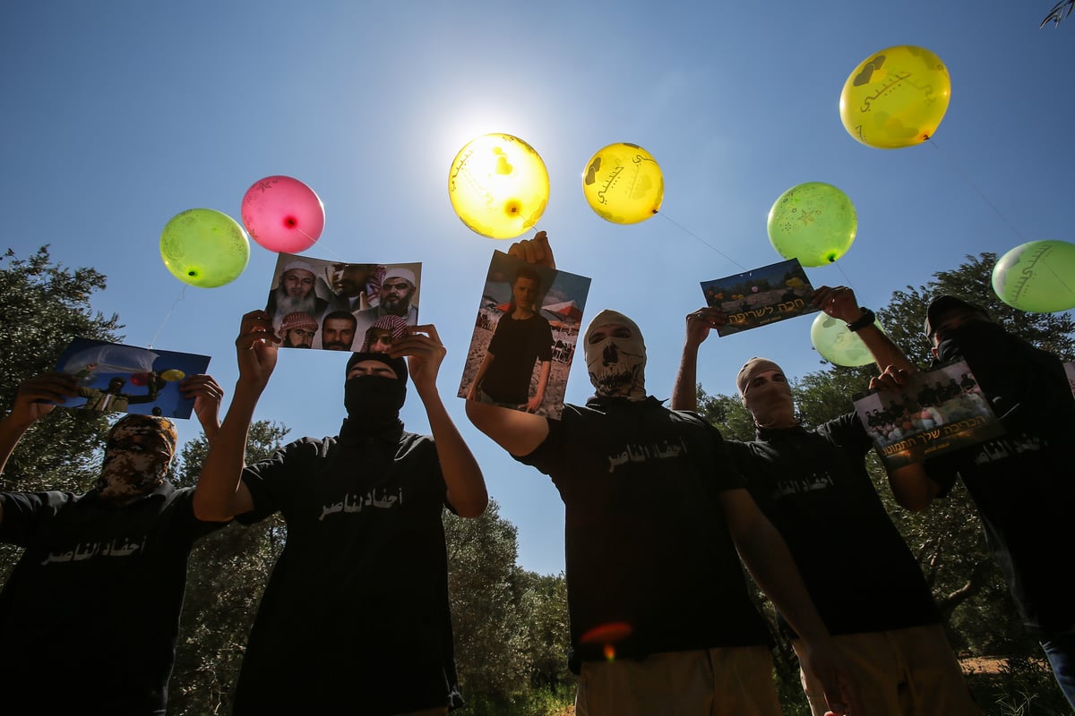 החמאס הפריח עשרות בלוני דמה ואיים; "תתכונן לגיהנום"