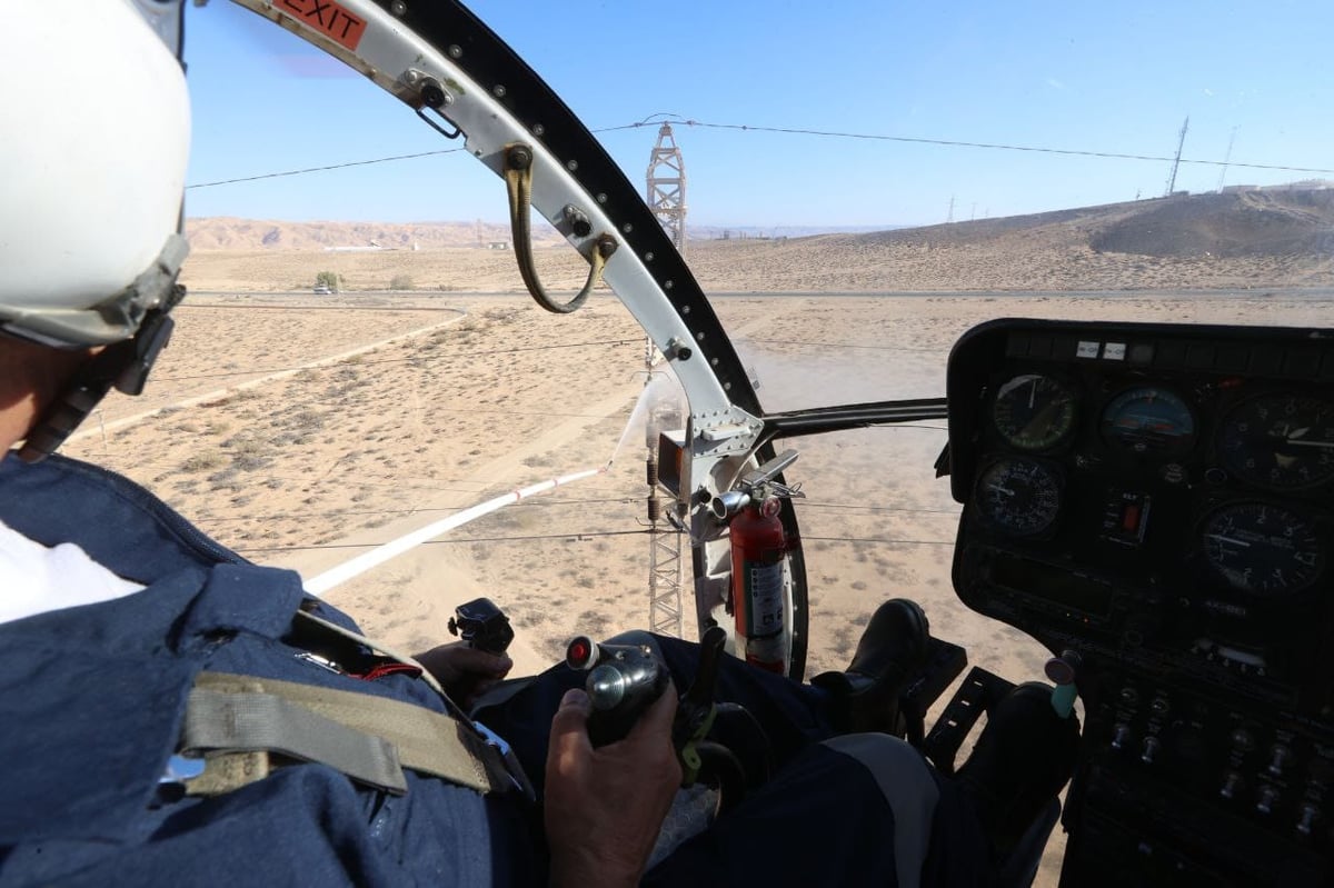 תיעוד מהמסוק: כך שוטפים את קווי החשמל