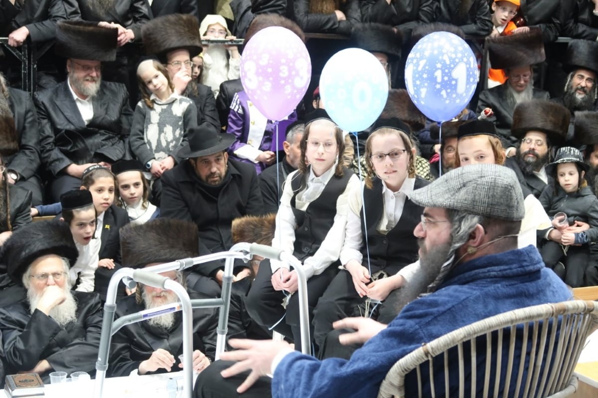 שולחן מיוחד לחלה הארוכה: פורים בחצר סערט-ויז'ניץ