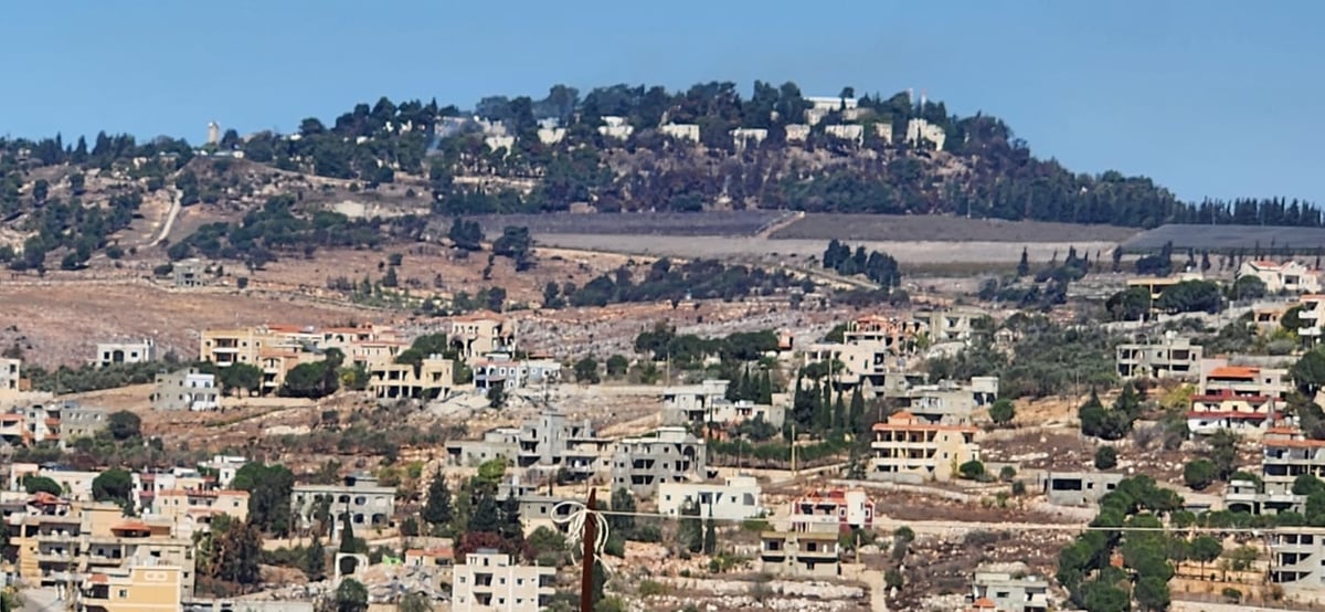 קיבוץ מנרה כפי שמשתקף מהצד הלבנוני. "את האיום הזה הלכנו לבטל ובהצלחה"