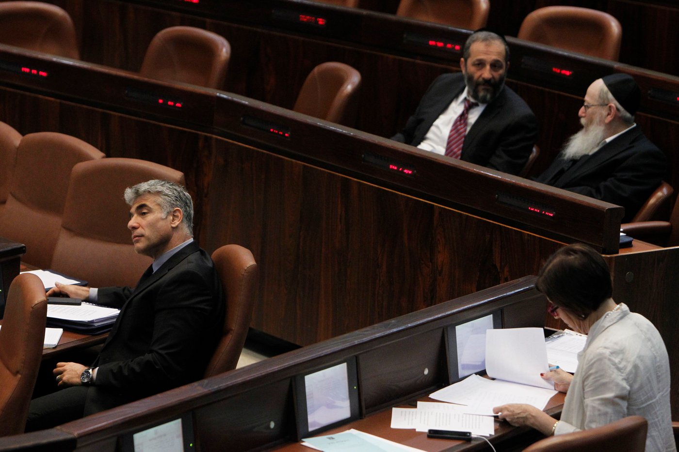 גלריה: מליאת הכנסת בעת השתלחות לפיד בחרדים