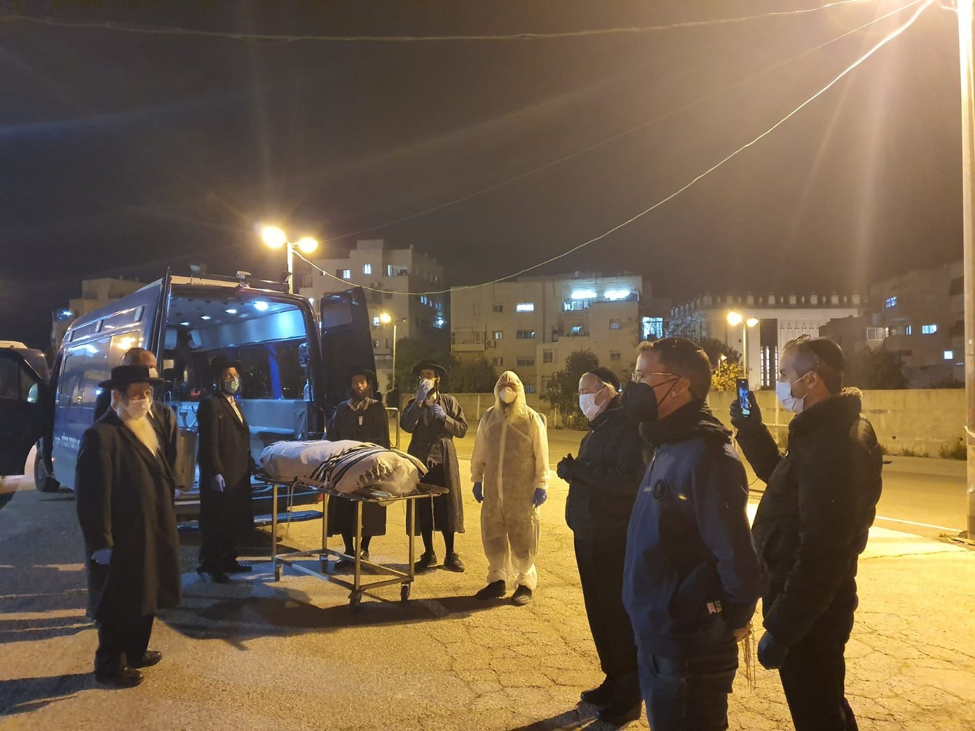המשולח שנדבק מהנגיף בחו"ל - נקבר • צפו