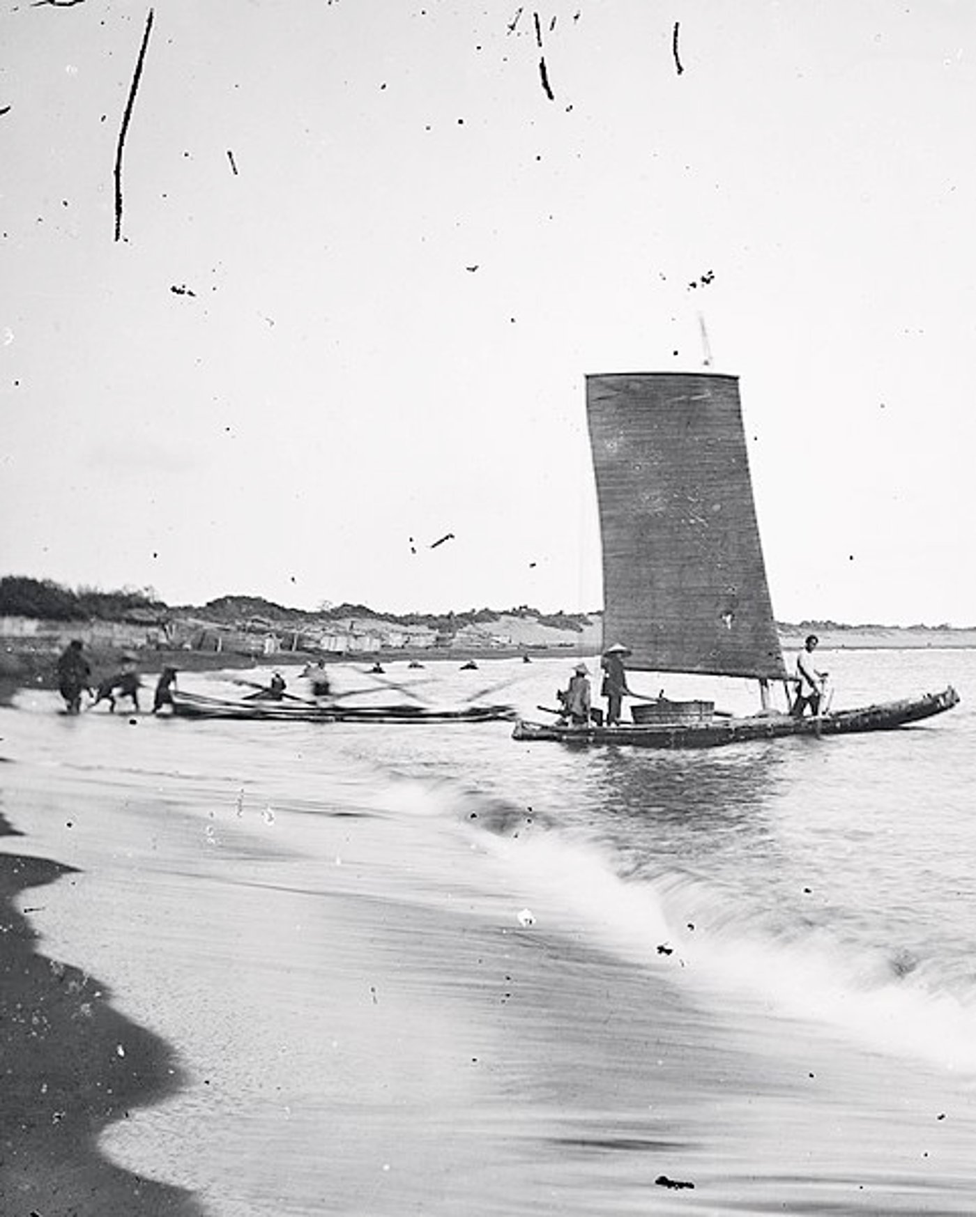 תושבים שטים בסירת במבוק. פורמוזה