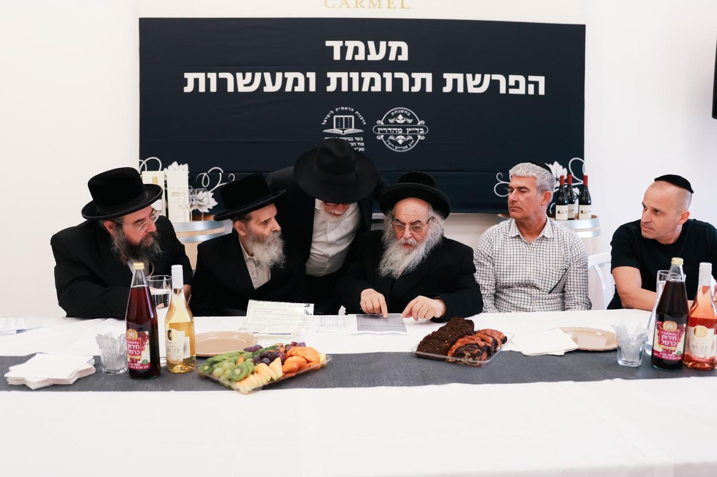 מעמד הפרשת תרומות ומעשרות ביקבי כרמל