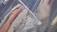 חשוד בגניבת בגדים נעצר: כך עבדה השיטה - שתועדה במצלמת החנות | צפו