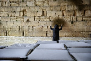 גלריה מרהיבה: הכותל המערבי מושלג