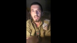 מתפרק בבכי מול המצלמות. צ'ארלי, אביו של אלאור. ארכיון