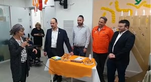 ראשי הארגון בהדלקת נרות בבית על"ה