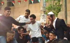 החרדים שרקדו בחתונה הערבית עם דגלי אש"ף מדברים