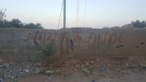 נזק למשאיות וכתובות גרפיטי בכפר קאסם