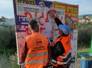 צפו: עובדי רכסים תלשו מודעות נגד חיסונים