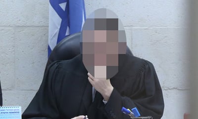 השופט החשוד בהכאת ילדיו