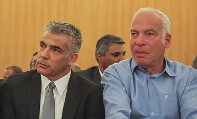 פעלו לקידום החוק. אורי אריאל ויאיר לפיד
