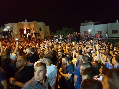 צפו: אלפים קברו את המחבלים מהר הבית