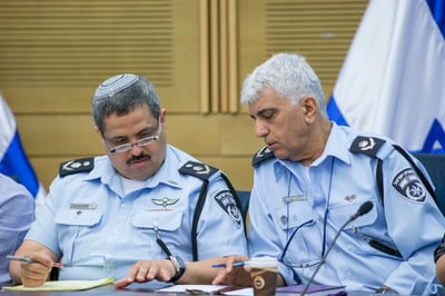 המפכ"ל אלשיך והניצב הפורש מני יצחקי