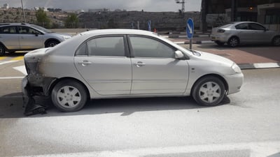 מעבר עופר: רכב עלה באש, הנהגת חולצה