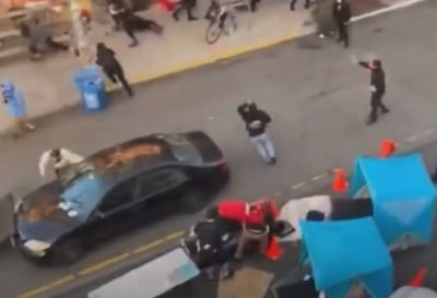 המהומות בארה"ב: נהג נחסם וירה על מפגין