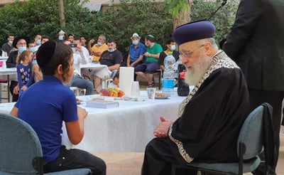 הראש"ל הספיד את הנרצח - והזמין את בניו
