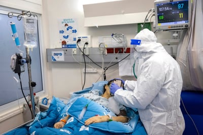 בכירים שוקלים הדבקה המונית נגד קורונה