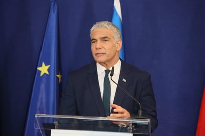 "לא מתכחשים לעבר"; לפיד דיבר בגרמניה