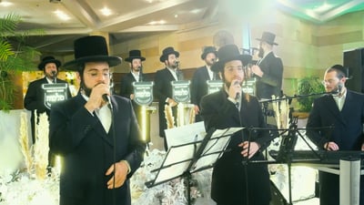 לייבי מושקוביץ, מוטי ויזל ו'מלכות' בחופה ייחודית
