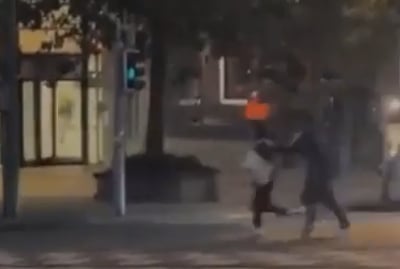 החשוד בירי - לבוש סרבל כחול