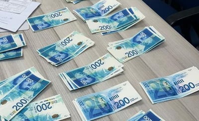 נסעו על קטנוע בצורה מחשידה ונתפסו עם שטרות מזוייפים