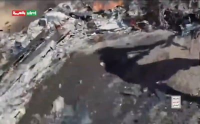 תיעוד: החות'ים מקפצים סביב כטב"מ אמריקני שהפילו