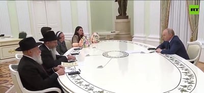 הנשיא פוטין בפגישה עם שורדי השבי