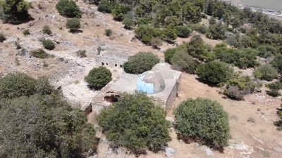 מלחיא - שרידי כפר עתיק ומבנה קבר ענק ומרשים של האמורא רבי יוסי ולדעת המוסלמים של יהושע בן נון
