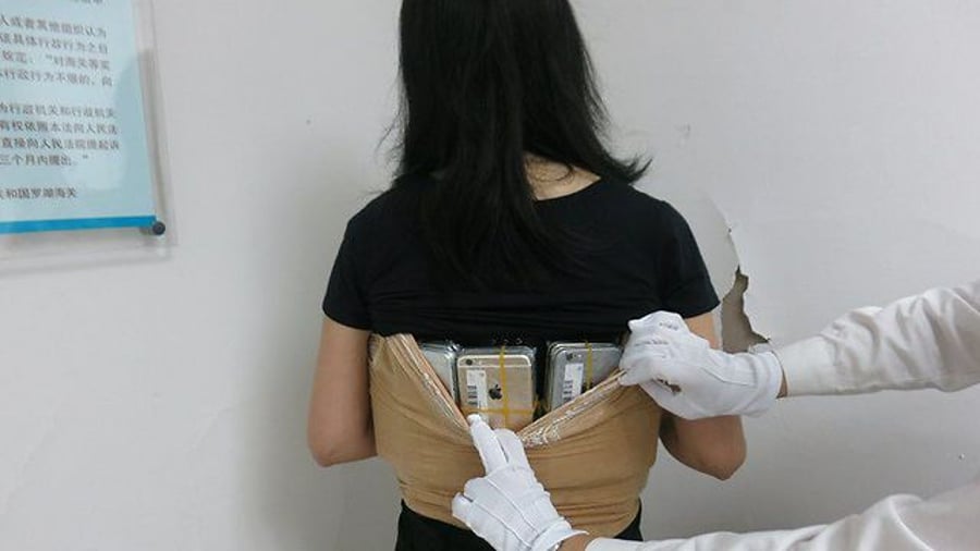 102 אייפונים נתפסו על גופה של אישה סינית