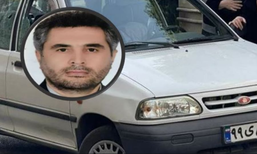 חסן סיאד חודאי לצד הרכב בו נורה למוות