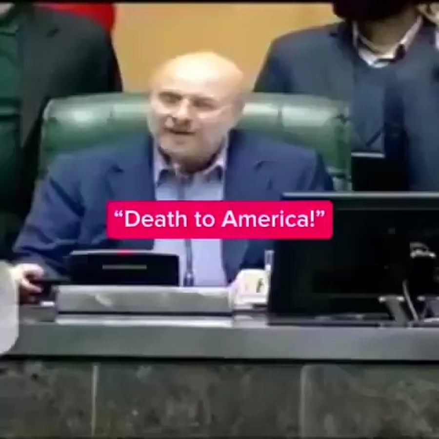 יו"ר הפרלמנט, מוחמד באקר קאליבאף. קורא: מוות לאמריקה